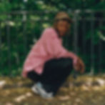 ASICS brand ambassador crouching outdoors wearing GEL-NYC trainersASICS brand ambassador crouching outdoors wearing GEL-NYC trainers