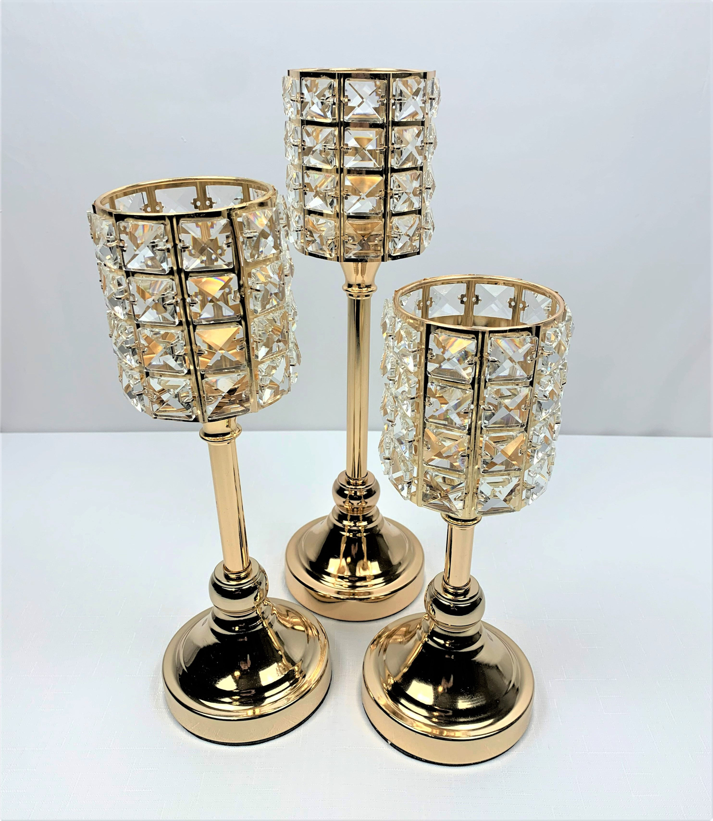 Set of Gold Pedestal Candle Holders