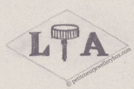 NAME: Lucien Achard INITIALS: L A SYMBOL: Watch crown DATES: 1924 - 1928 SPECIALITY: JewellerPLACE: 18 rue Commines, Paris, France