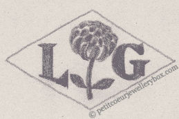 French Maker's Mark
NAME: Lucien Gruet INITIALS: L G SYMBOL: Dahlia DATES: 1936 - SPECIALITY: Silversmith PLACE: 49 avenue Corot, le Vésinet, France