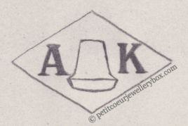 French Maker's Mark
NAME: 		Achille Kermann INITIALS: A K SYMBOL: Thimble	DATES: 1888 -  SPECIALITY: Jeweller PLACE: 5 rue Volta, Paris, France