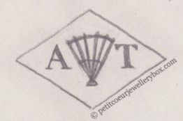 French Maker's Mark
NAME:                	   Alexandre Taupinard	INITIALS: A T    SYMBOL: Fan		DATES: 1905 - 	SPECIALITY: Jeweller     PLACE: 28 rue du Four, Paris, France