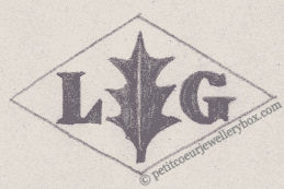 French Maker's Mark
NAME: Léon Graffeuil INITIALS: L G SYMBOL: Holly leaf DATES: 1902 - SPECIALITY: Silversmith PLACE: 3 rue Greneta, Paris, France
