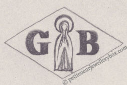 Poinçon de maître orfèvre joaillier, poinçon de fabricant, poinçon d’atelier, poinçon losangique. NOM: Gabriel Bonamy INITIALES: G B SYMBOLE: Vierge Marie DATES: 1926 - PROFESSION: Bijoutier ADRESSE: 20 rue d'Angoulême, Paris, France