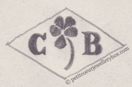 Poinçon de maître orfèvre joaillier, poinçon de fabricant, poinçon d’atelier, poinçon losangique.   NOM:                 Calixte Buisson INITIALES: C B SYMBOLE: Pensée DATES: 1925 -PROFESSION: Bijoutier ADRESSE: 23 allée du Jardin Anglais, Le Raincy, France