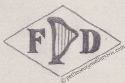 French Maker's Mark
NAME: Fernand Dubos INITIALS: F D SYMBOL: Harp DATES: 1950 - SPECIALITY: Jeweller PLACE : 14 rue Eugène Varlin, Paris, France