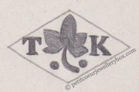 French Maker's Mark
NAME: Thadée Kwasniewski INITIALS: T K SYMBOL: Ivy leaf and 2 dots DATES: 1919 - SPECIALITY: Jeweller PLACE: Paris, France