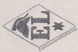 Poinçon de maître orfèvre joaillier, poinçon de fabricant, poinçon d’atelier, poinçon losangique. NOM: Ferdinand Everaerts INITIALES: E F SYMBOLE: Chat DATES: 1930 - PROFESSION: Bijoutier ADRESSE: 205 rue de Paris, Ivry-sur-Seine, France