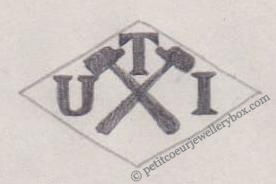 French Maker's Mark
NAME: Etablissements UTI INITIALS: U T I SYMBOL: 2 crossed hammers DATES: 1942 - SPECIALITY: Jeweller PLACE: 139 boulevard de Sébastopol, Paris, France
