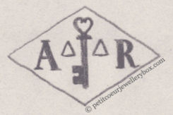 French Maker's NAME:                	  NAME: Aïda Risi	INITIALS: A R    	SYMBOL: 		Key and 2 triangles			DATES: 1960 -SPECIALITY: Jeweller		PLACE: 53 rue Sainte-Anne, Paris, France
