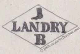 Poinçon de maître orfèvre joaillier, poinçon de fabricant, poinçon d’atelier, poinçon losangique. NOM: Ferdinand Everaerts INITIALES: E F SYMBOLE: Chat DATES: 1930 - PROFESSION: Bijoutier ADRESSE: 205 rue de Paris, Ivry-sur-Seine, France