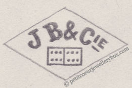 Poinçon de maître orfèvre joaillier, poinçon de fabricant, poinçon d’atelier, poinçon losangique NOM: Jules Barraguil & Compagnie INITIALES: J B & Cie SYMBOLE: Domino DATES: 1880 - PROFESSION: Bijoutier ADRESSE: 97 rue de Richelieu, Paris, France