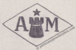 Poinçon de maître orfèvre joaillier, poinçon de fabricant, poinçon d’atelier, poinçon losangique.     NOM:                  André Malbrand INITIALES: A M SYMBOLE:           Tour et étoile DATES: 1929 - PROFESSION: Orfèvre     ADRESSE: 2 passage Saint-Sébastien, Paris, France