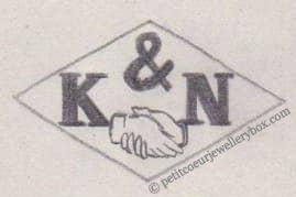 French Maker's Mark
NAME: Koehler & Niederlender INITIALS: K & N SYMBOL: Handshake DATES: 1902 - SPECIALITY: Jeweller PLACE: 196 rue Saint-Martin, Paris, France
