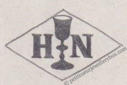 Poinçon de maître orfèvre joaillier, poinçon de fabricant, poinçon d’atelier, poinçon losangique. NOM:           Ferdinand Everaerts INITIALES: E F SYMBOLE: Chat DATES: 1930 - PROFESSION: Bijoutier ADRESSE: 205 rue de Paris, Ivry-sur-Seine, France