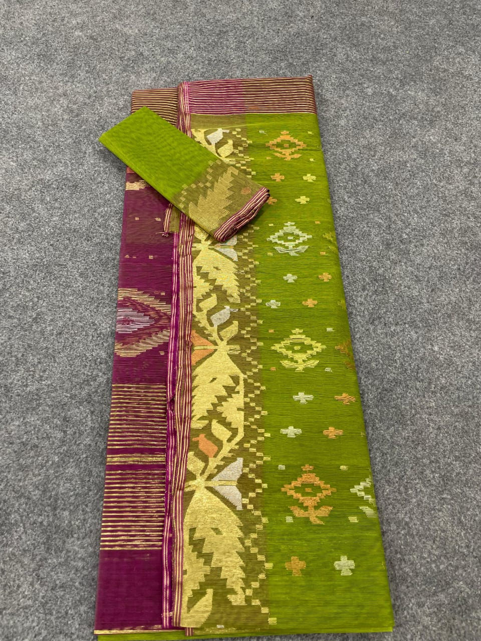 Swamp Green color half silk jamdani saree with blouse piece
