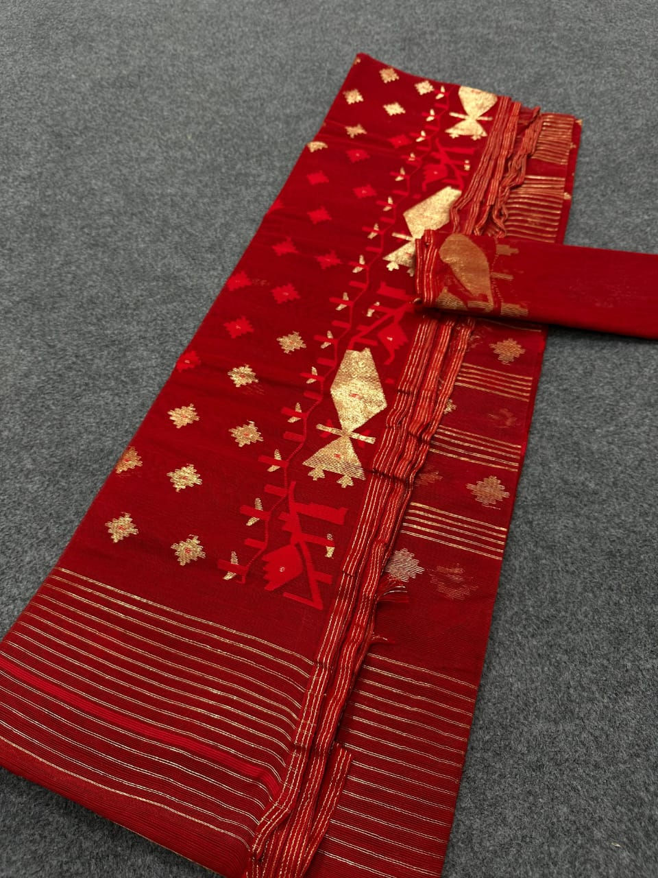 Red color half silk jamdani saree with blouse piece