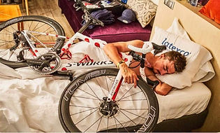 Julian-Alaphilippe-sleeping-with-bicycle.jpg