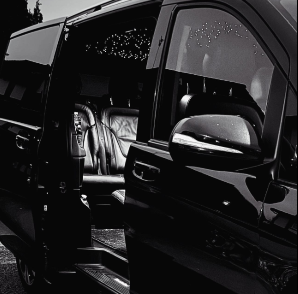 Eye-level view of a sleek S-Class Mercedes parked elegantly
