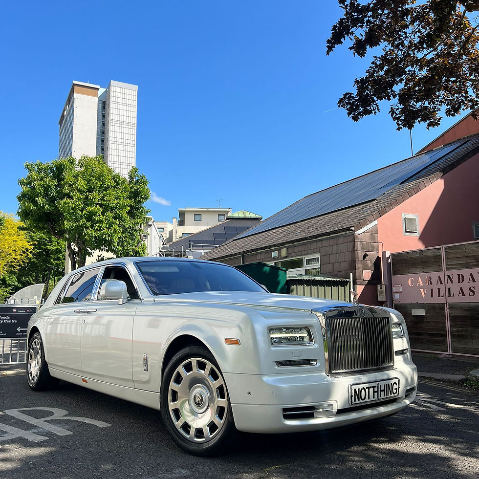 White Rolls-Royce Phantom EWB chauffeur vehicle providing ultra-luxury executive transport and VIP chauffeur services in London, ideal for weddings, corporate travel and high-end private hire.