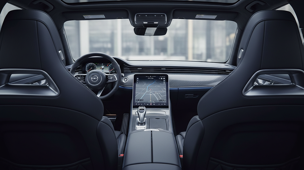 Close-up view of a luxury car interior with leather seats and polished dashboard