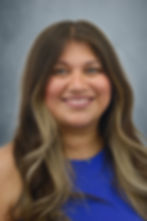 la esperanza clinic provider wearing gold scrubs