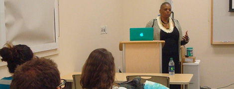 Doctor giving a talk in a classroom
