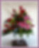 Arreglo 24 Rosas y Lirio en Vidrio