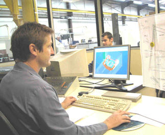 Fabrication assistée par ordinateur par logiciel CFAO.