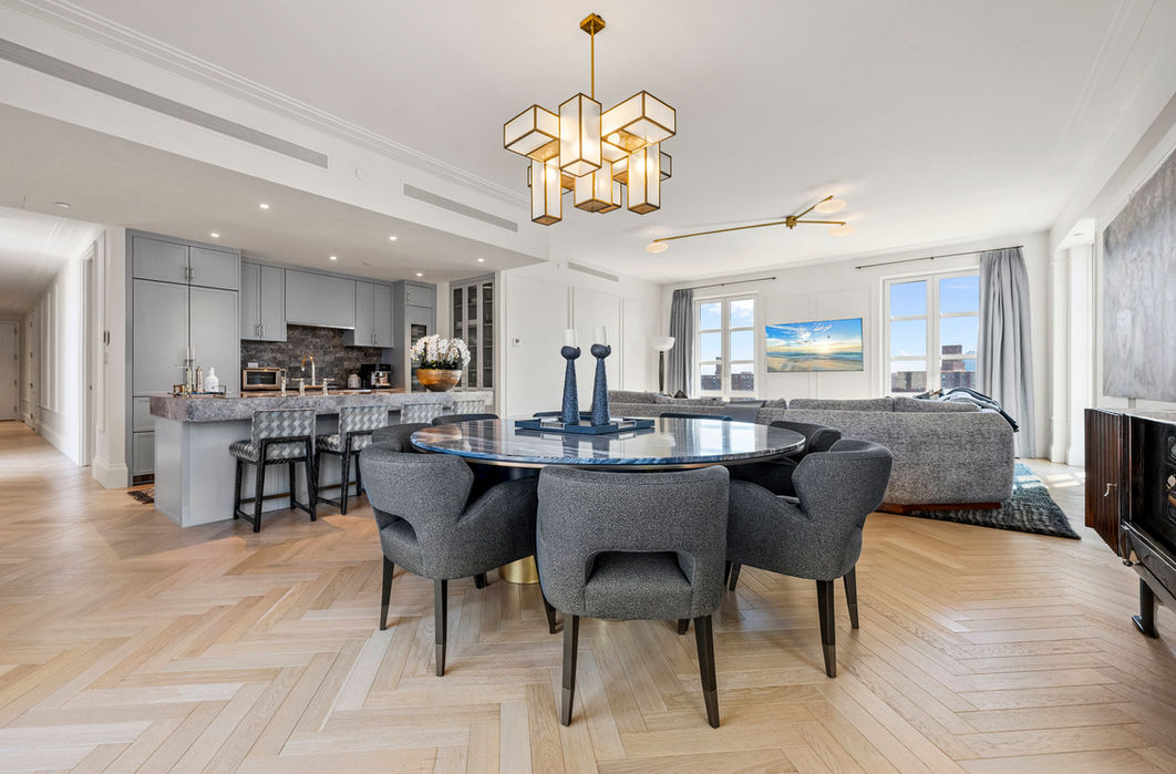 Spacious open-concept living and dining room interior captured by RealtaSnap for property photography.