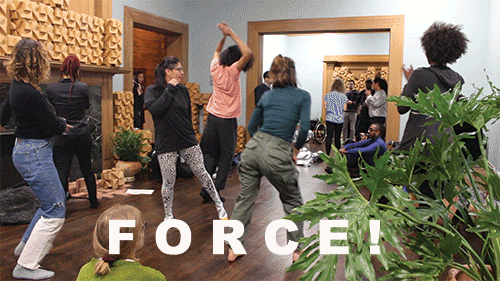 FORCE! an opera in 3 acts | a cluster of BIPOC folks dancing and grooving among green plants
