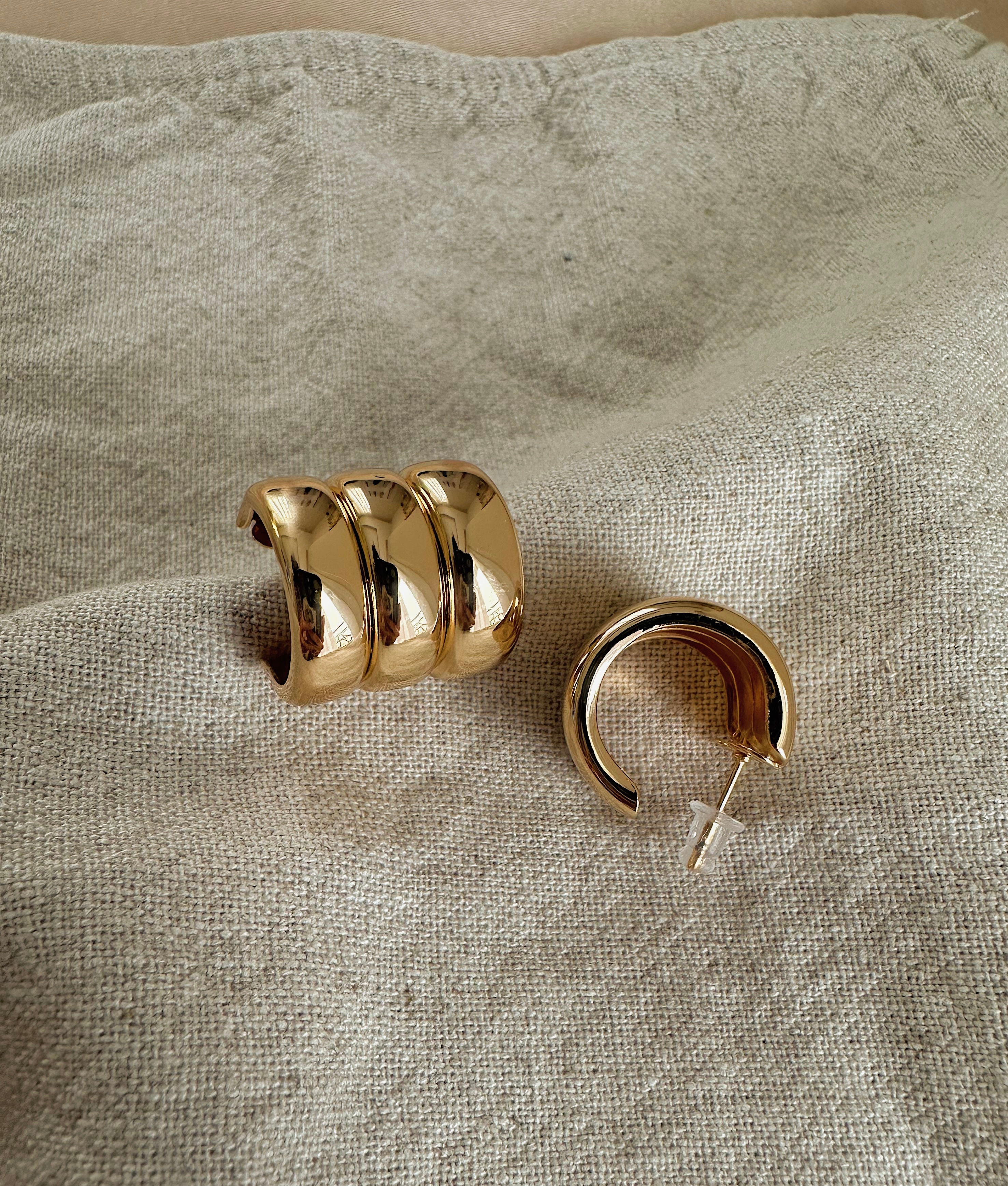 Üçlü Gözüken Küpe