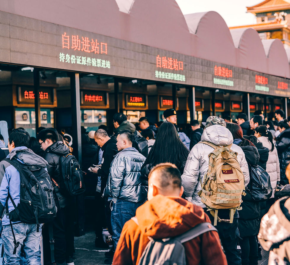 Sports fans entering a stadium ticketing counter