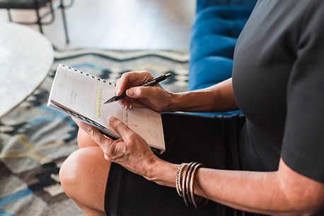 woman writing notes