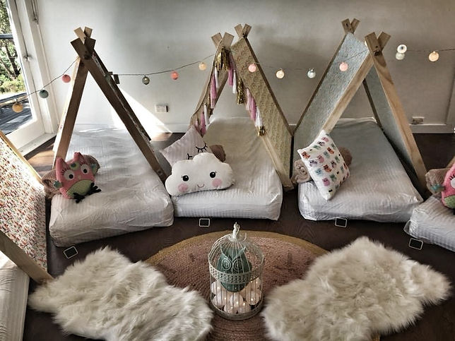 Sleepover party for kids. Our Tent Pegs Teepee package is ideal for the young kids, set up indoors at your house and consist in 5 teepees with mattresses, fitted sheets, blankets, pillows, cushions and decorations such bunting and fairy light between so much more, so your kids can be set off to dreamland after having the time of their life