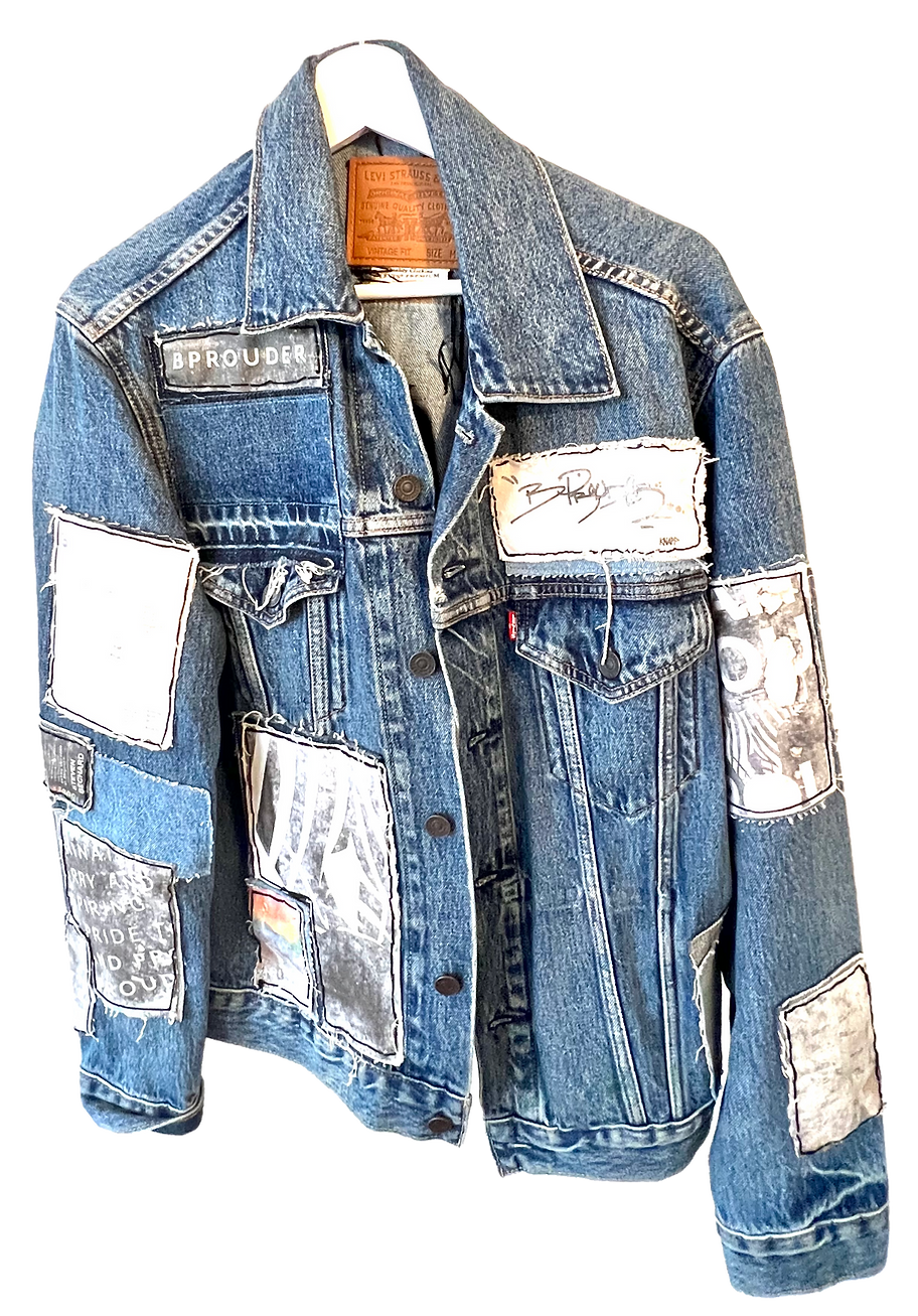 Blue denim jacket with patches