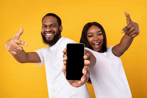 Black couple showing blank empty smartphone screen for mockup.jpg