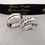 Miniatura: Par de alianças em prata com pedras