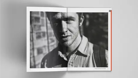 a book is open to a page with a portrait of a man