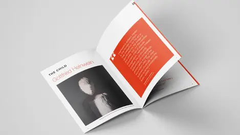 a book is open to a page about Godfried Heinwein