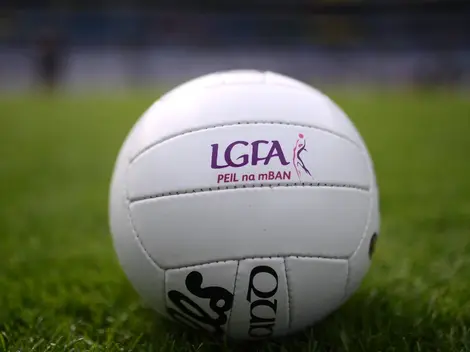 a white volleyball that says lgfa on it