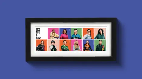 a framed poster that says it's not a race