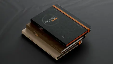 a book by anthony walsh is stacked on top of another book