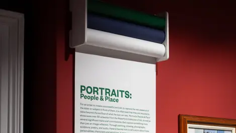 a sign that says portraits people & place on it