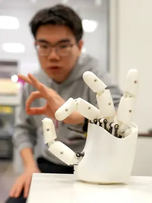 The hand that teaches the robot