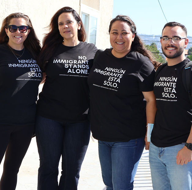 Four ImmDef staff together at the border.