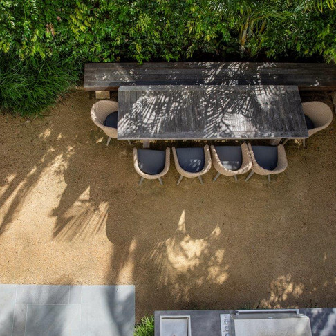Outdoor dining area on decomposed granite