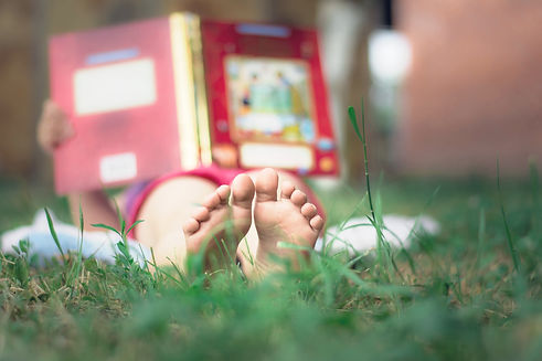 Child Reading in the Grass_edited.jpg