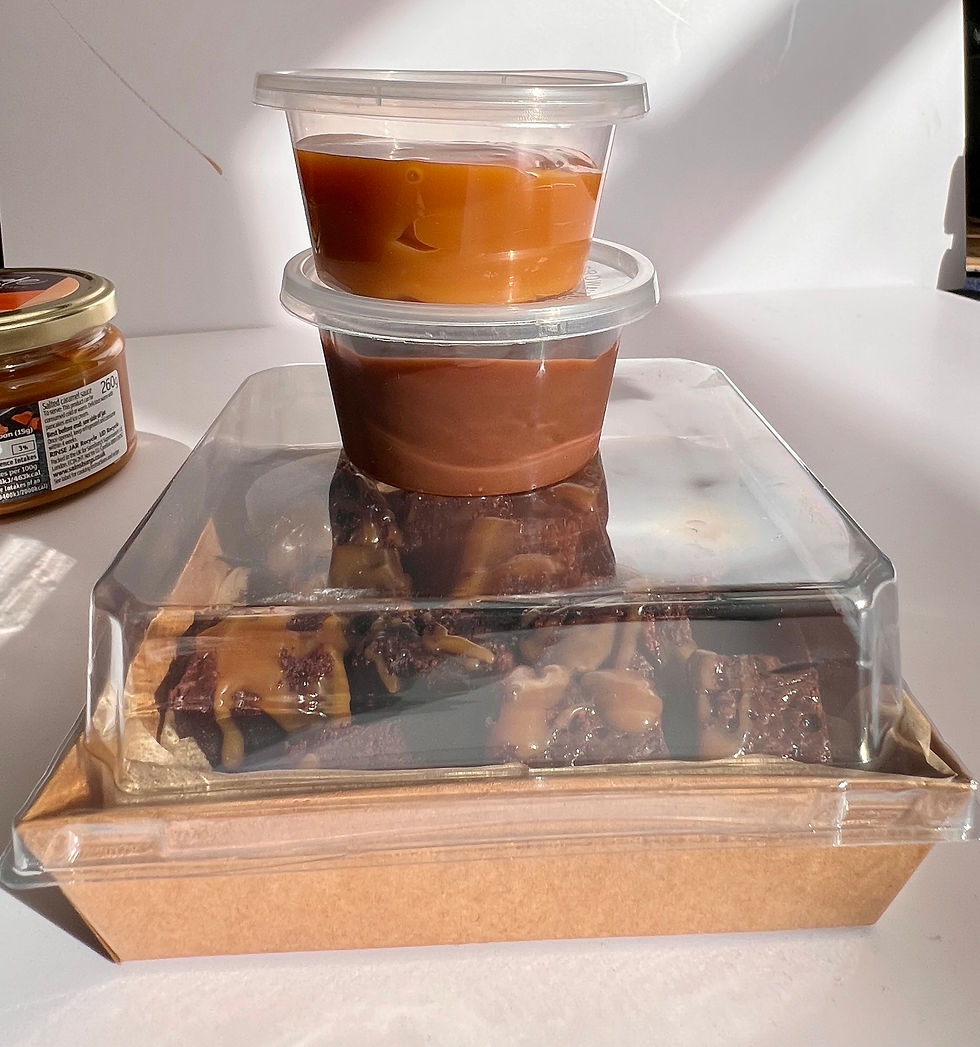 Thumbnail: gluten free fudgy brownie bites box with two pots of dips