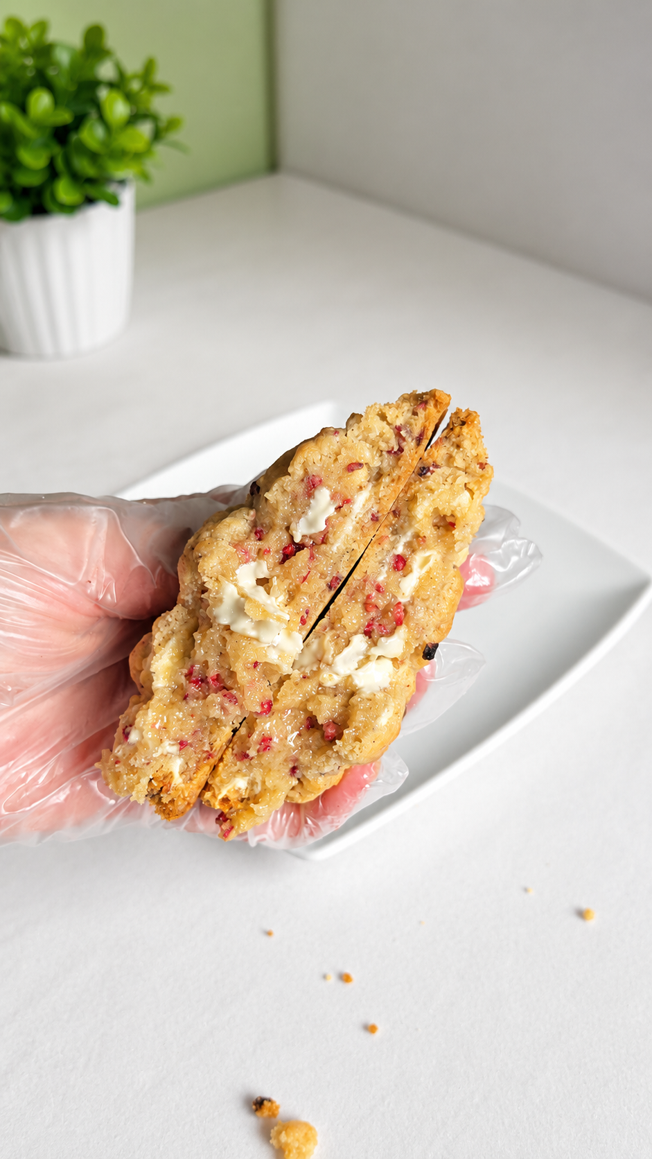 Thumbnail: raspberry white chocolate cookie in half